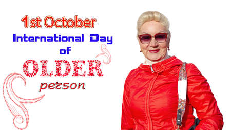 Portrait of a happy elderly woman in bright clothesの写真素材