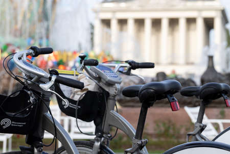 Bicycle rental station on public parking in the city. Selective focusの写真素材