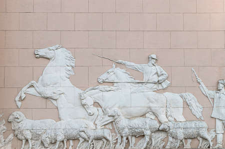 Moscow, Russia, September 30, 2020: Exhibition of Achievements of the National Economy, VDNKh. Popular sights of Moscow. Life of the Kazakh people. Marble bas-relief on the Kazakhstan pavilionのeditorial素材