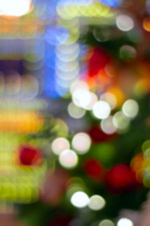 Defocused image, holiday illumination and decoration concept, christmas garland bokeh lightsの写真素材