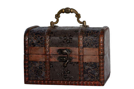Closed old chest, decorated with floral designs. Isolate on a white background.