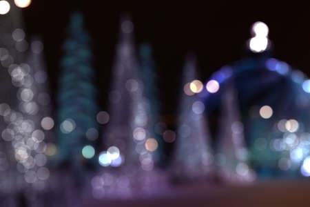 Blue Festive Christmas elegant abstract background with bokeh lights and stars, holiday festival backdropの写真素材