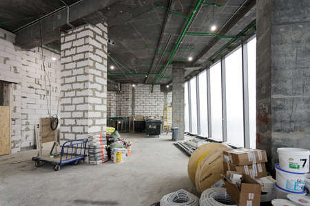 Moscow, Russia, 12.02.2021 Construction work on the interior decoration of a modern office or...