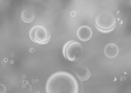 Silver defocused Lights on gray background for Christmas holiday seasonal wallpaper decoration greeting and wedding invitation card design elementの写真素材