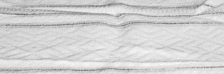 Textile background with white tablecloth. Texture of ancient linen canvas handmade. copyspace. Place for food and drink. Restaurant menuの写真素材
