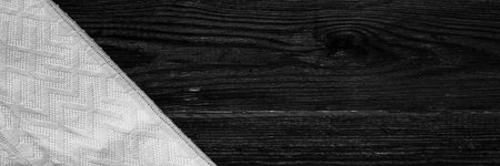 Textile background with white tableclothon a wooden background. selective focus. copyspace. Place for food and drink. Picnic and thanksgiving day concept. Restaurant menuの写真素材
