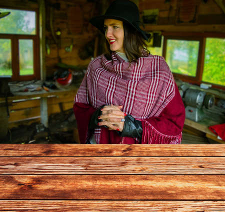 woman in blacksmith shop. Interior of an old forge. Desk of free space and workshopの写真素材