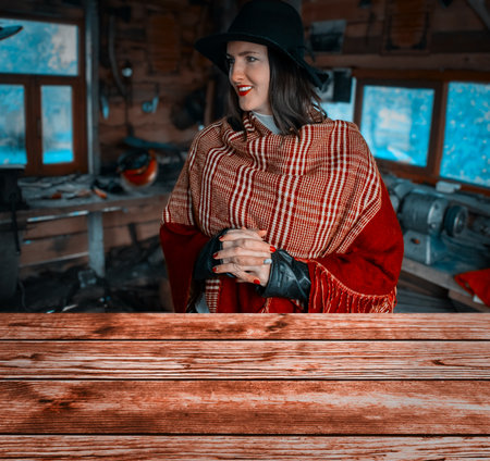 woman in blacksmith shop. Interior of an old forge. Desk of free space and workshopの写真素材