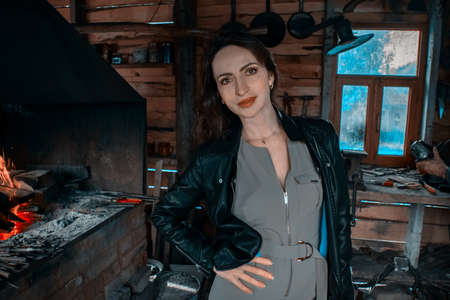 woman in blacksmith shop. Interior of an old forge.の写真素材