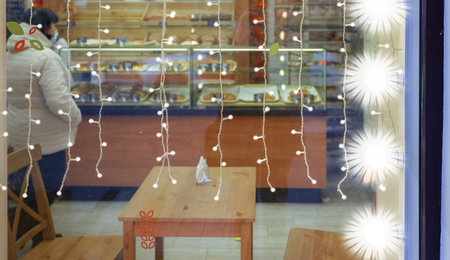 Showcase decorated with light garlands. empty spaceの写真素材