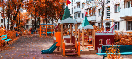 Children's playground for outdoor games on an autumn day. The concept of healthy recreation and child development. Useful entertainment for children.の写真素材