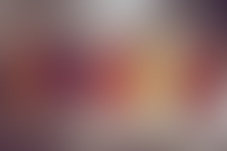 Soft gradient color background in autumn colors. Gradient yellow orange background. Gradient golden light. Abstract background in golden colors for your design. Elegant template for your design.の写真素材