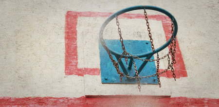 Closeup shot of a basketball ring with metal chains. Concept of success, scoring points and winning. Copy spaceの写真素材
