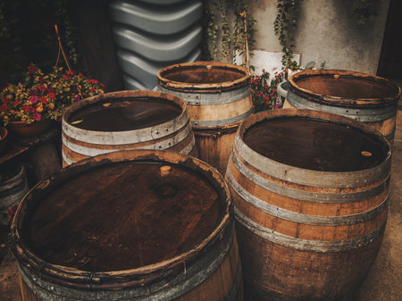 Large wooden barrels. Background from wine barrels. France.