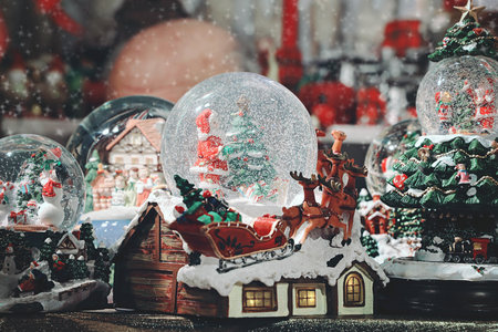 Christmas market stall with variety of types of Christmas decoration displayed for selling....