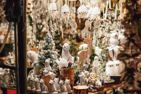 Sales of Christmas decorations on the traditional Christmas market. Christmas and New Year decoration decorative white toy.の写真素材