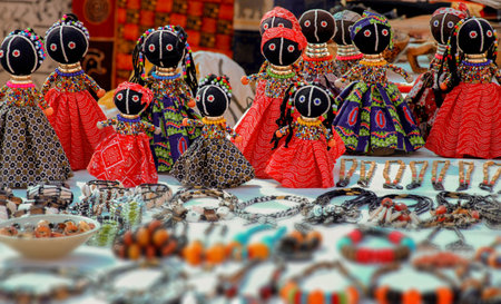 African art. Traditional southern African dolls, crafted from colorful beads. African unique traditional handmade colorful beads ragdolls. Local craft market in South Africa.の写真素材