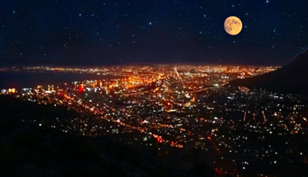 Cape Town at Night Cityscape Panorama. City at night with a full moon in the sky