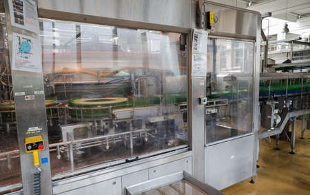 A filling machine with beer bottles in it is seen during production process in the Molson Coors Kamenitza beer brewery, April 28, 2015, near the city of Haskovo, Bulgaria.のeditorial素材