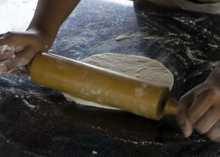pizza making fire wood burn fire place sauce cookingの写真素材