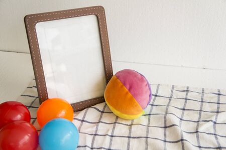 picture frame toy children child ball colorful clothの写真素材