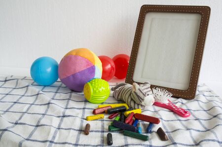 picture frame toy children child ball colorful clothの写真素材