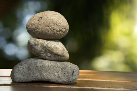 zen rock tri Spiritual stack wood floor stoneの写真素材