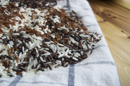 whole grain white rice on clothの写真素材