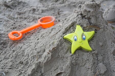 play sand castle with plastic toys