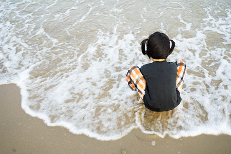 child play beach enjoy activity sea beach happy の写真素材