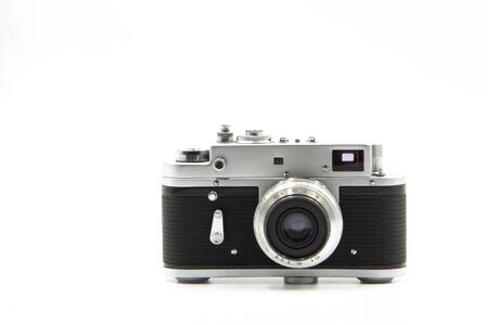 Old Vintage Film Camera and Camera Films Preparing for Travel Isolate on White Background