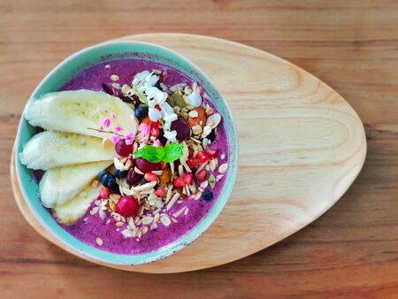 Cereal mix with yogurt plus banana on topの写真素材