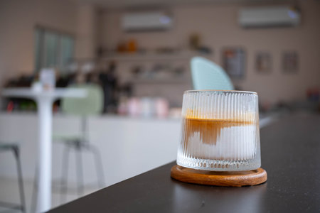 The Coffee Menu called Dirty Coffee a Glass of Ristretto Coffee shot on Cold Milk by coffee machineの写真素材