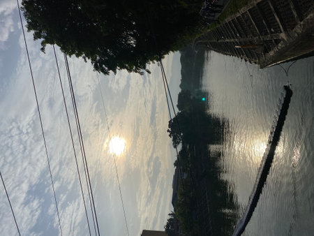Reflection of the sun in the water of a canal in Chinaの写真素材