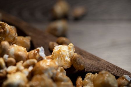 FRESH POPPED CARAMEL CORN WITH PEANUTSの写真素材