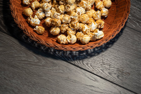 FRESH POPPED CARAMEL CORN WITH PEANUTSの写真素材