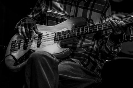 Close up of a musician playing a guitar.の写真素材