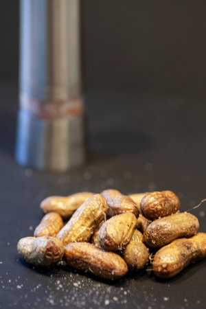 Boiled peanuts in the shell with salt.