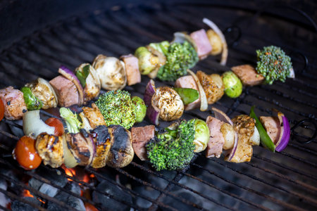 Grilled chicken and vegetable shish kebabsの写真素材