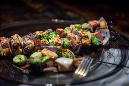 Grilled chicken and vegetable shish kebabsの写真素材