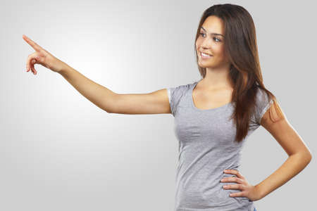 Young woman pointingの写真素材