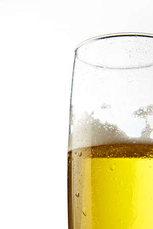 Glass of beer over isolated backgroundの写真素材