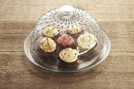 Cupcakes in glass pastryの写真素材