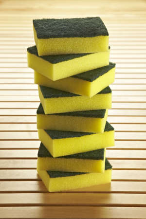 8 sponges to clean dishes stacked in the kitchenの写真素材