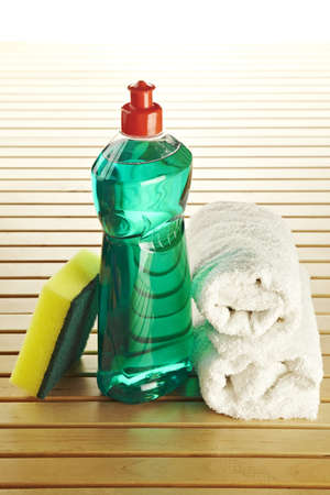 Composition with bottle scrourer and towelの写真素材