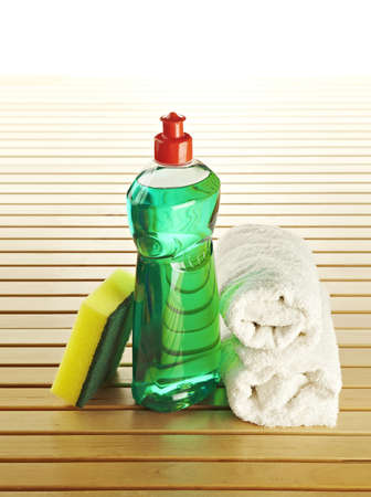 Composition with bottle scrourer and towelの写真素材