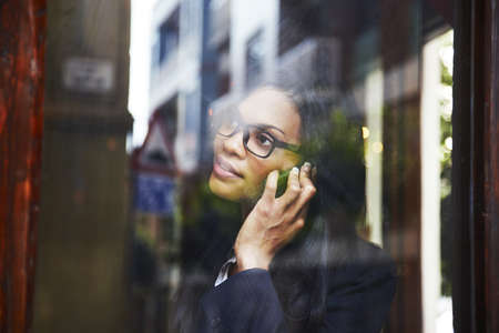 calling somebody by mobile telephoneの写真素材