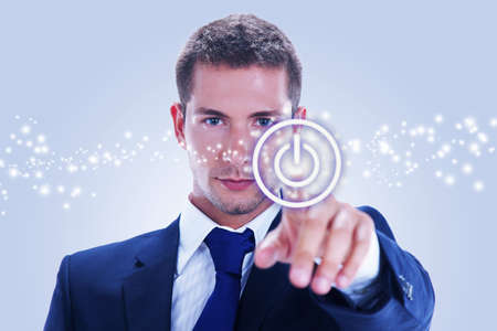 Business man pressing ON   OFF buttonの写真素材