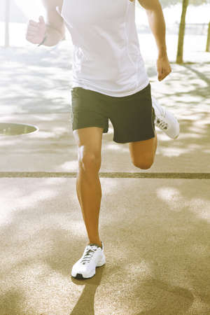 man run outdoor with sunの写真素材