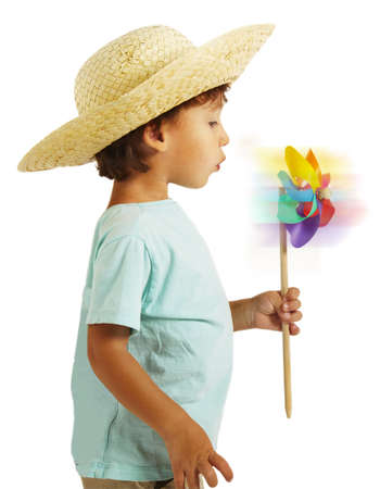 portrait of a little boy playing over isolated background